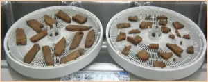 Pieces of meat on dryer tray